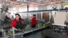 Armenia -- Workers at a manufacturing enterprise in Yerevan.