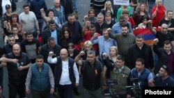 Armenia - Opposition leader Artur Vanetsian and members of his Fatherland party march through Yerevan, April 28, 2022.