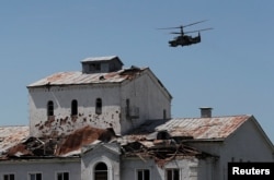 Ка-52 "Аллигатор" над Попасной, оккупированная часть Луганской области Украины, 2 июня 2022 года