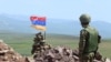 Armenia - An Armenian soldier stands guard on the border with Azerbaijan, June 17, 2021.