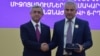 Armenia - President Serzh Sarkisian (L) awards a state medal to Russian-Armenian businessman Samvel Karapetian, Yerevan, 26Sep2015.