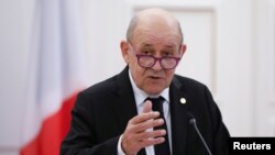 GREECE - French Foreign Minister Jean-Yves Le Drian attends a news conference following his meeting with Greek Foreign Minister Nikos Dendias in Athens, November 19, 2021.