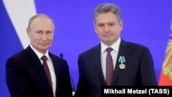 Уладзімір Пуцін і кіраўнік Кангрэсу міжнароднага руху русафілаў Мікалай Малінаў. Архіўнае фота