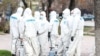 Алматы көшесін дезинфекциялап жүргендер. 28 наурыз 2020 жыл.