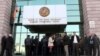 Armenia - People wait outside a district court building in Yerevan, January 9, 2012.