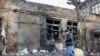 Магазин в Донецке, разрушенный обстрелом