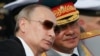 Президент России Владимир Путин и министр обороны Сергей Шойгу