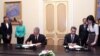 Armenia -- Prime Minister Tigran Sarkisian (R) and Viktor Khristenko, chairman of the Eurasian Economic Commission, sign a memorandum in Yerevan, 10Apr2013.