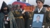Armenia - The funeral of Lieutenant Gurgen Markarian, an Armenian army officer who was axe-murdered by an Azerbaijani colleague during a NATO training course in Budapest, 25Feb2004.