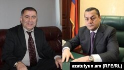 Armenia -- Parliament deputies Arayik Grigorian (R) and Murad Muradian.