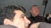 Оппозиция (вверху) наседает на председателя грузинской ЦИК (внизу) в буквальном смысле