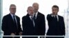 Федеральный канцлер Германии Олаф Шольц (второй слева) разговаривает с британским премьером Киром Стармером (слева направо), президентом США Джо Байденом и президентом Франции Эммануэлем Макроном. Берлин, 18 октября 2024