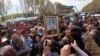 Armenia - Relatives of Lyuks Stepanian, a soldier killed by a fellow conscript on May 15, demonstrate on a highway 50 kilometers north of Yerevan, 18May2013.