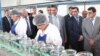 Nagorno-Karabakh - Armenian Prime Minister Tigran Sarkisian (C) visits a food-processing plant in the Askeran district, 1Aug2011.