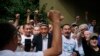 KAZAKHSTAN -- Supporters of Serikzhan Bilash, who has campaigned for the release of ethnic Kazakhs in China, react in front of a court building in Almaty, Kazakhstan, Friday, Aug. 16, 2019.