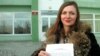Ларыса Шчыракова з судовым пратаколам