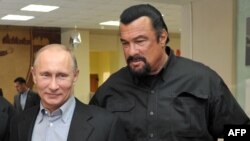Владимир Путин и звезда голливудского кино Стивен Сигал