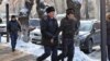 Полицейские задерживают участников митинга в Алматы. 16 декабря 2019 года.