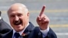 RUSSIA -- Belarusian President Alyaksandr Lukashenka gestures as he leaves after the Victory Day Parade on Red Square in Moscow, June 24, 2020