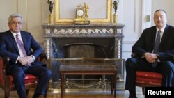 Switzerland -- Armenian President Serzh Sarkisian (L) and his Azerbaijani counterpart Ilham Aliyev meet for talks on the Nagorno-Karabakh conflict at the invitation of Swiss Foreign Minister Didier Burkhalter in Bern, December 19, 2015