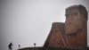 Nagorno-Karabakh - A man walks towards the iconic statue "We Are Our Mountains" outside Stepanakert on November 12, 2020.