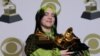 U.S. -- U.S. singer-songwriter Billie Eilish poses in the press room with the awards for Album Of The Year, Record Of The Year, Best New Artist, Song Of The Year and Best Pop Vocal Album during the 62nd Annual Grammy Awards, in Los Angeles, January 26, 20