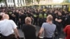 Желтые автобусы и полицейские кордоны разделили акцию националистов и антиоккупационный митинг на проспекте Руставели