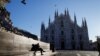 Romania- People walk through a near-empty Duomo square, usually full of people, coronavirus