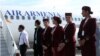 Armenia -- Air Armenia crew prepare for the company's inaugural flight from Yerevan's Zvartnots airport, 23 October 2013.