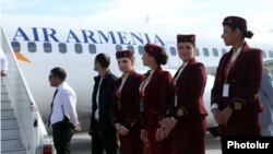 Armenia -- Air Armenia crew prepare for the company's inaugural flight from Yerevan's Zvartnots airport, 23 October 2013.