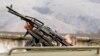 Российский военнослужащий возле украинской военной базы в Перевальном, возле Симферополя