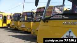 Armenia -- Commuter buses belonging to the King Delux company, Abovian, 11Jul2012.