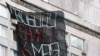 Russia -- A banner reading "Free Bolotnaya Square case suspects" put up on Novy Arbat Street in Moscow, 06May2013