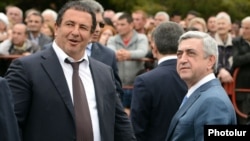 Armenia - President Serzh Sarkisian (R) and businessman Gagik Tsarukian attend the consecration of a new church built by the latter in Abovian, 14May2013.